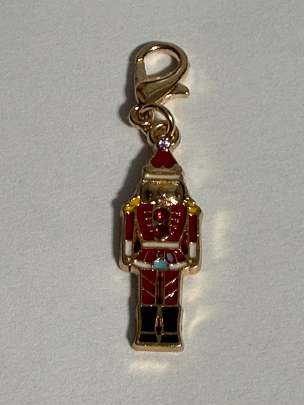 Gold-Tone Red Nutcracker Charm for necklace or zipper.